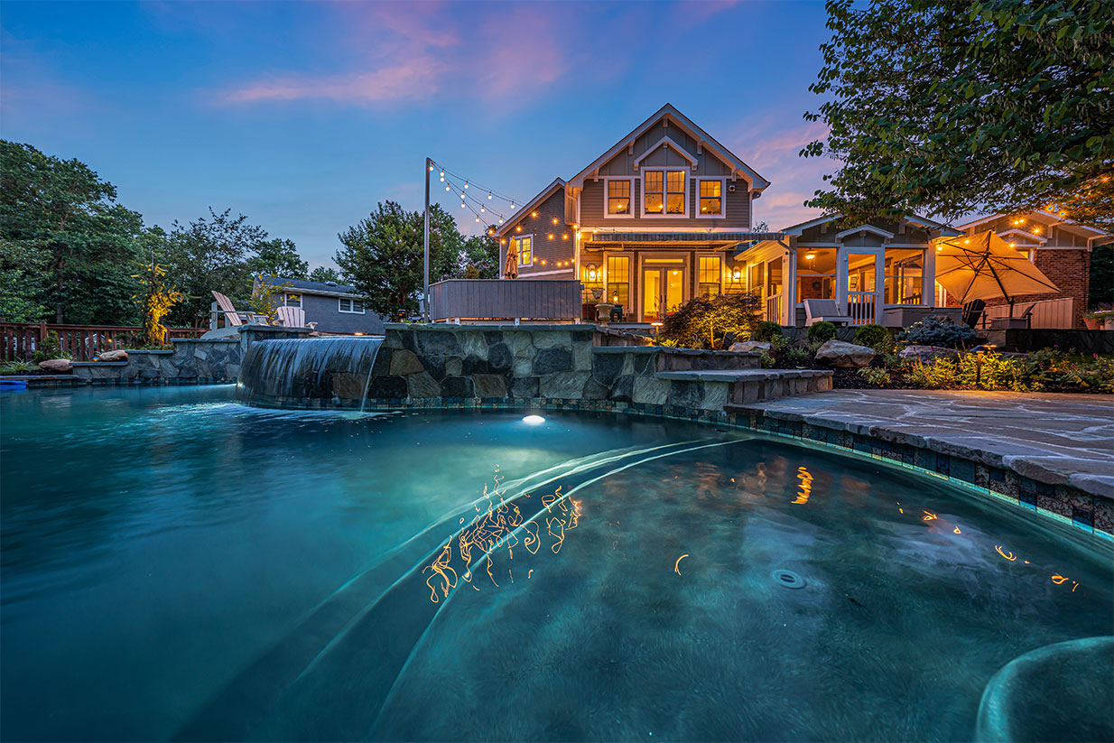 Water features and lighting upgrades adding ambiance to pool spaces