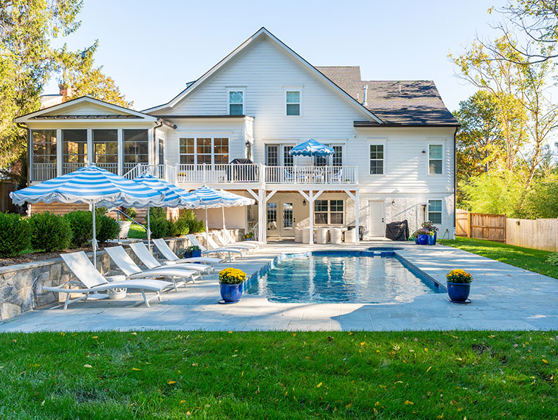 Pool remodeling project showing upgraded modern backyard features